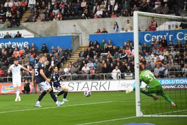 Ryan Manning #3 of Swansea City scores a goal to make it 1-0