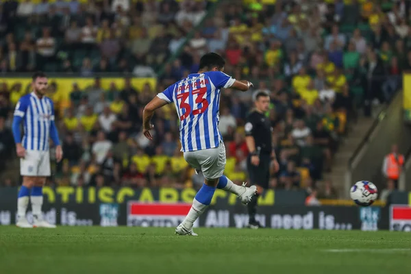 Yuta Nakayama #33 of Huddersfield Town shoots a free kick at goal