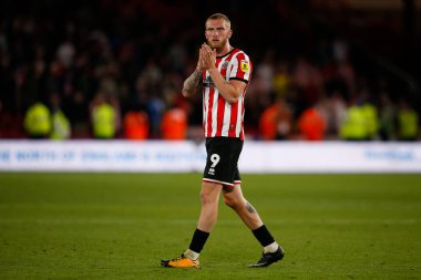 Oliver McBurnie #9 of Sheffield United applauds fans after the game