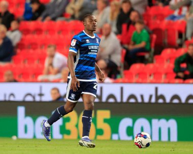 Marc Bola #27 of Middlesbrough runs with the ball