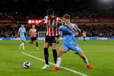 Anel Ahmedhodzic #15 of Sheffield United and Dennis Cirkin #3 of Sunderland 