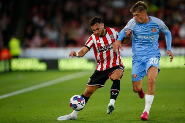George Baldock #2 of Sheffield United and Jack Clarke #20 of Sunderland 