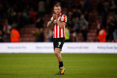 Oliver McBurnie #9 of Sheffield United applauds fans after the game