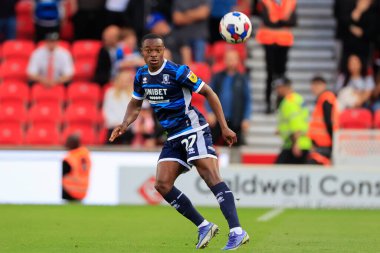 Marc Bola #27 of Middlesbrough passes the ball