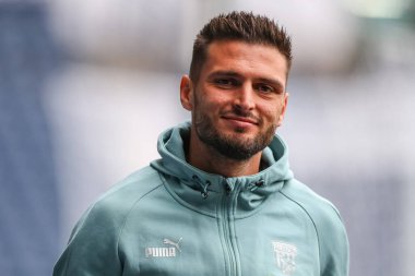 Okay Yokuslu #35 of West Bromwich Albion arrives at the game ahead of kick off