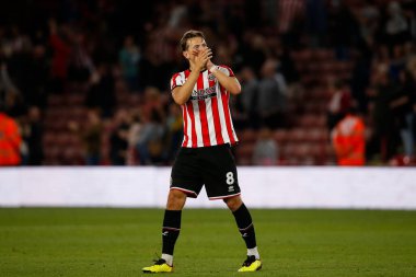 Oliver McBurnie #9 of Sheffield United applauds fans after the game