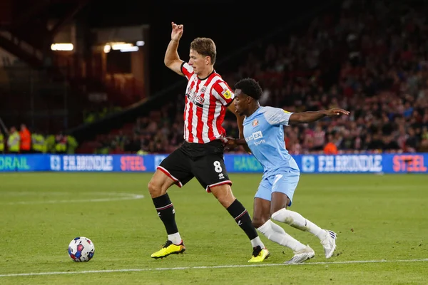 Sander Berge #8 of Sheffield United and Jay Matete #27 of Sunderland 