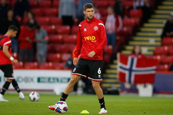 Chris Basham #6 of Sheffield United warms up before the game