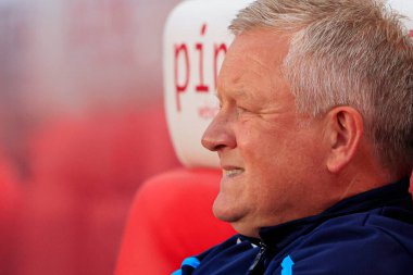 Chris Wilder the Middlesbrough manager takes his place in the dug out