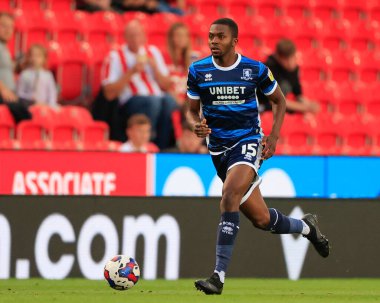 Anfernee Dijksteel #15 of Middlesbrough runs with the ball