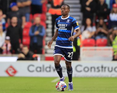 Marc Bola #27 of Middlesbrough runs with the ball