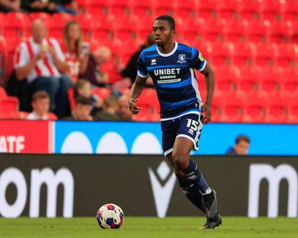 Anfernee Dijksteel #15 of Middlesbrough runs with the ball