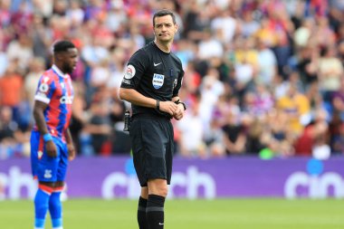 Referee Andy Madley seen prior to kick off. 