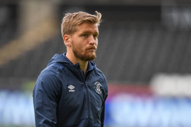 Luke Berry #8 of Luton Town inspects the pitch Pre Kick off