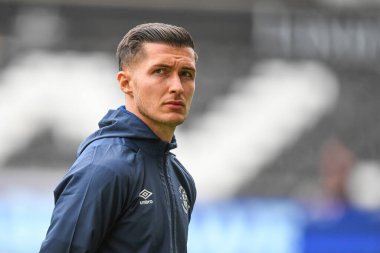 Dan Potts #3 of Luton Town  inspects the pitch Pre Kick off