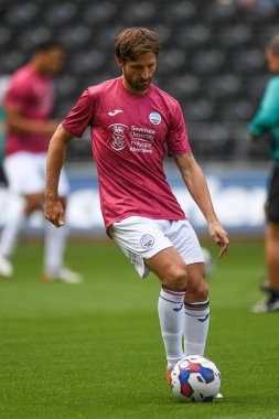 Joe Allen #7 of Swansea City during the pre-game warmup 
