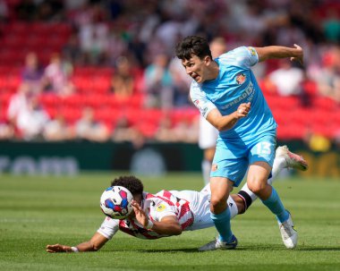 Jacob Brown #9 of Stoke City is Brough down by Luke O'Nien #13 of Sunderland 