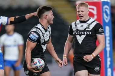 Ben McNamara #19 of Hull FC celebrates his try to make it 4-12