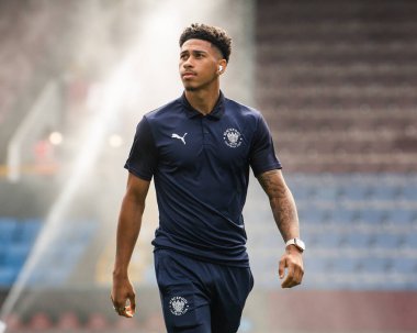 Jordan Lawrence-Gabriel #4 of Blackpool arrive at Turf Moor, Home of Burnley