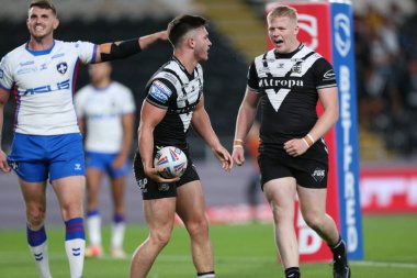 Ben McNamara #19 of Hull FC celebrates his try to make it 4-12