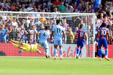 GOAL: Wilfried Zaha of Crystal Palace scores from the rebound. 