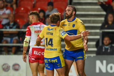 Kane Linnett #12 of Hull KR celebrates his try