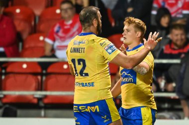 Will Tate #28 of Hull KR celebrates his try