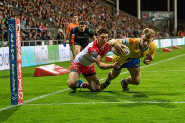 Connor Barley #38 of Hull KR goes over for a try