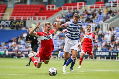Marcus Forss #21 of Middlesbrough is fouled by Sam Hutchinson #4 of Reading 