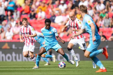 Will Smallbone #18 of Stoke City competes for the ball with Jay Matete #27 of Sunderland 