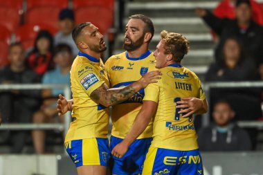 Kane Linnett #12 of Hull KR celebrates his try