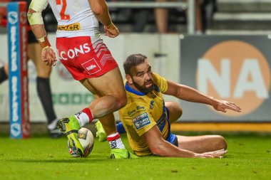 Kane Linnett #12 of Hull KR goes over for a try