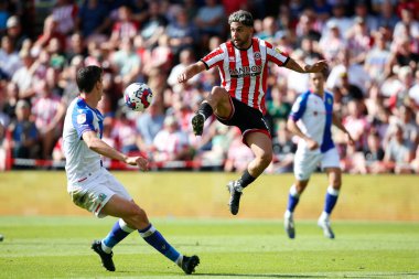 Reda Khadra #11 of Sheffield United and Daniel Ayala #4 of Blackburn Rovers  