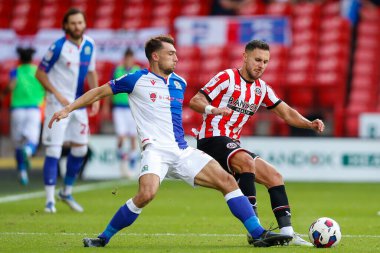 Harry Pickering #3 of Blackburn Rovers  and George Baldock #2 of Sheffield United 