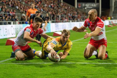 Connor Barley #38 of Hull KR goes over for a try