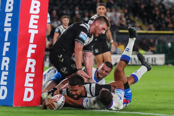 Chris Satae #10 of Hull FC goes over for a try in the final minutes of the match