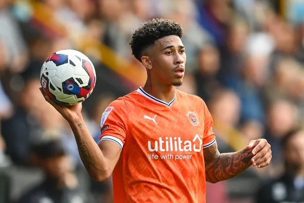 Jordan Lawrence-Gabriel #4 of Blackpool prepares to take a throw in