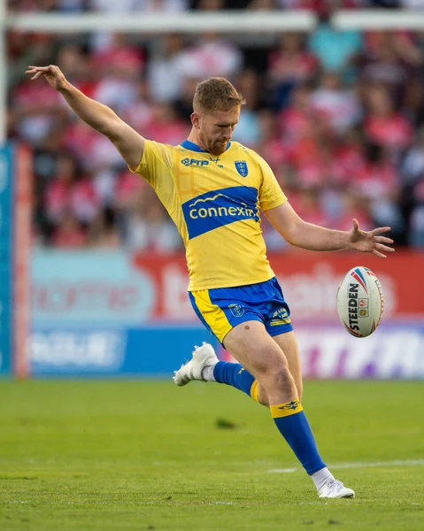 Rowan Milnes #21 of Hull KR kicks ahead