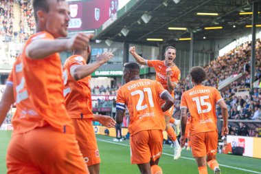 Jerry Yates #9 of Blackpool celebrates his goal to make it 3-3