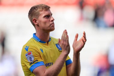 Mark McGuiness #34 of Sheffield Wednesday applauds the fans at the end of the game