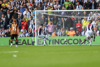 Karlan Grant #18 of West Bromwich Albion scores a penalty to make it 4-0