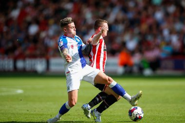 John Fleck #4 of Sheffield United and Sammie Szmodics #8 of Blackburn Rovers
