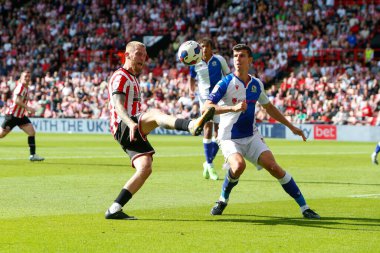Oliver McBurnie #9 of Sheffield United and Daniel Ayala #4 of Blackburn Rovers  
