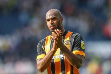 Oscar Estupin #19 of Hull City applauds the travelling fans 