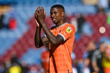 Marvin Ekpiteta #21 of Blackpool applauds the fans at the end of the game