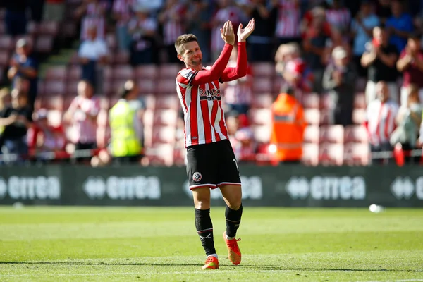 Oliver Norwood #16 of Sheffield United applauds fans after the game