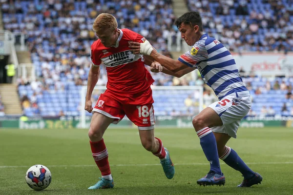 Duncan Watmore #18 of Middlesbrough and Tom McIntyre #5 of Reading tussle for the ball