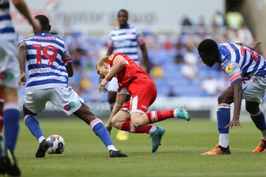 Duncan Watmore #18 of Middlesbrough is fouled by Mamadou Loum #22 of Reading 