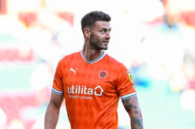 Gary Madine #14 of Blackpool is all smiles at the end of the game
