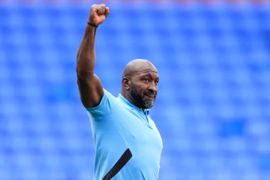 Darren Moore the Sheffield Wednesday manager salutes the fans at the end of the game
